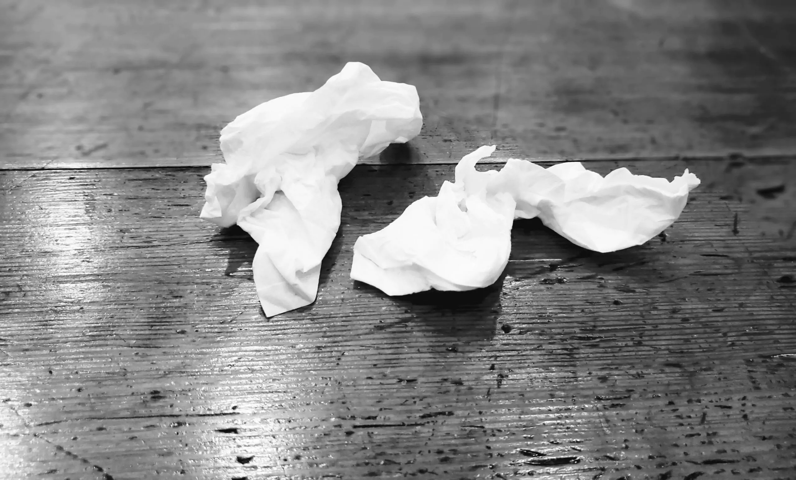 Black and white photo of used tissues